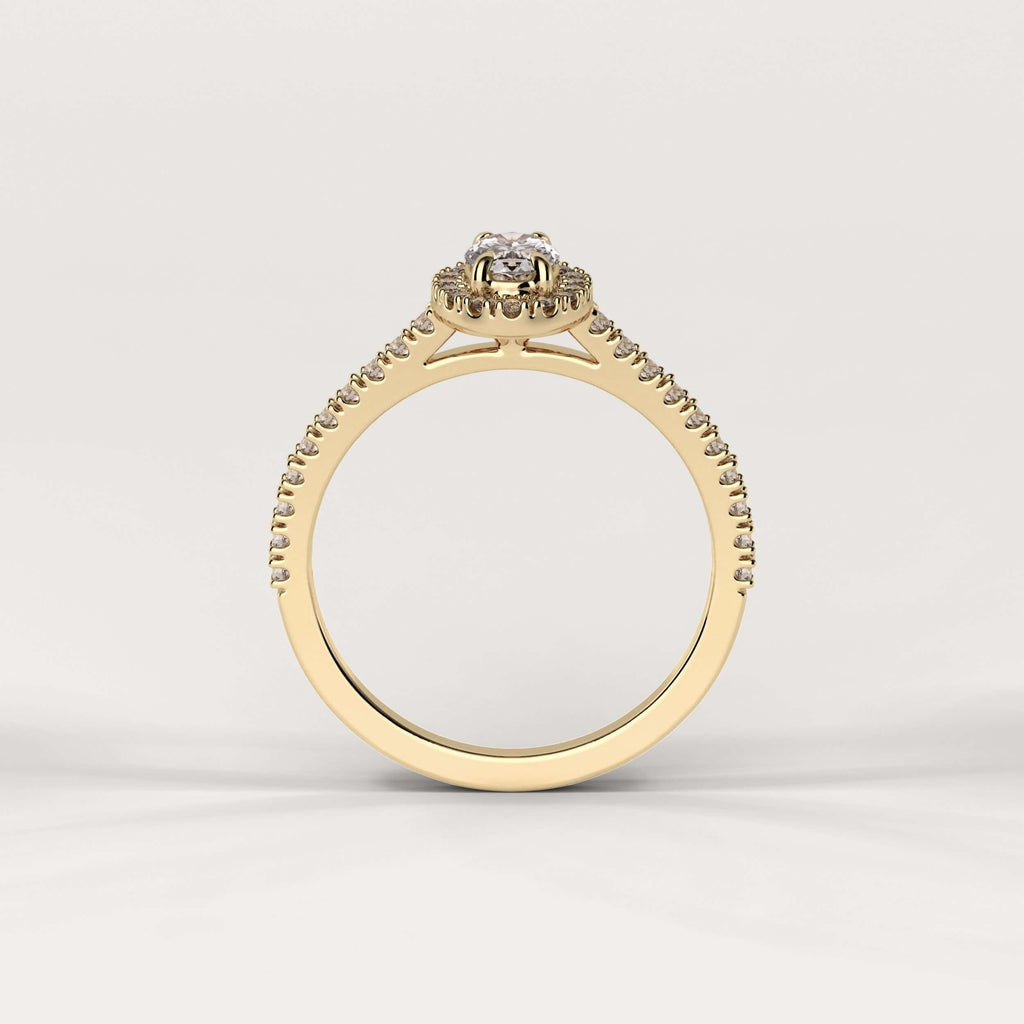 Ring med oval diamant og halo i 18 karat guld og GIA certifikat