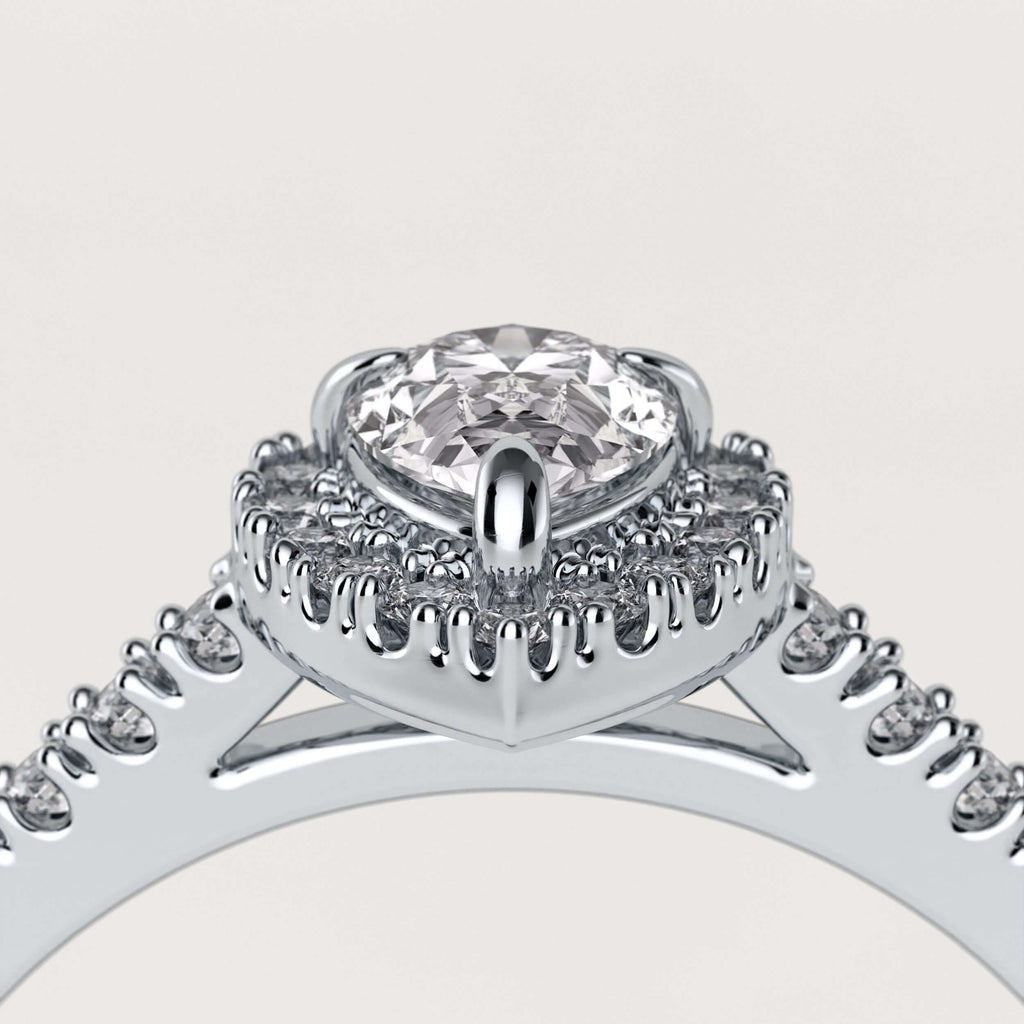 forlovelsesring i platin med pæreslebet diamant 