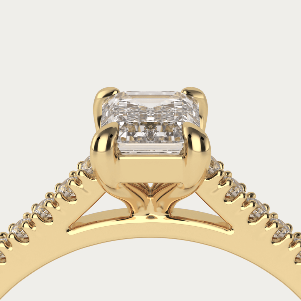 Pavé ring med emerald cut diamant i 18 karat guld med GIA certifikat