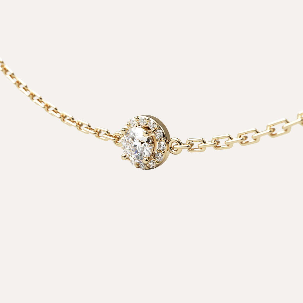 et solitaire armbånd i 14k guld med diamanter