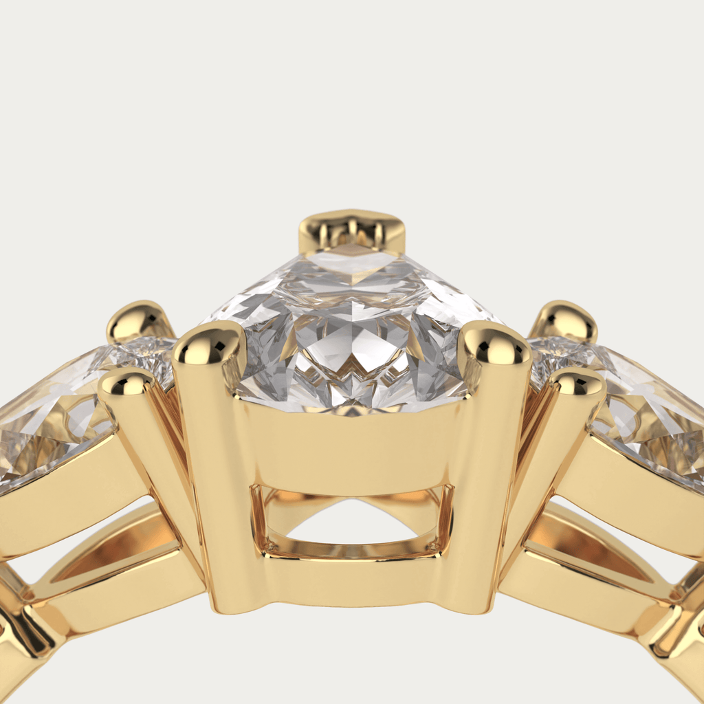 Trestensring med pæreslebet diamanter i 18 karat guld og GIA certifikat