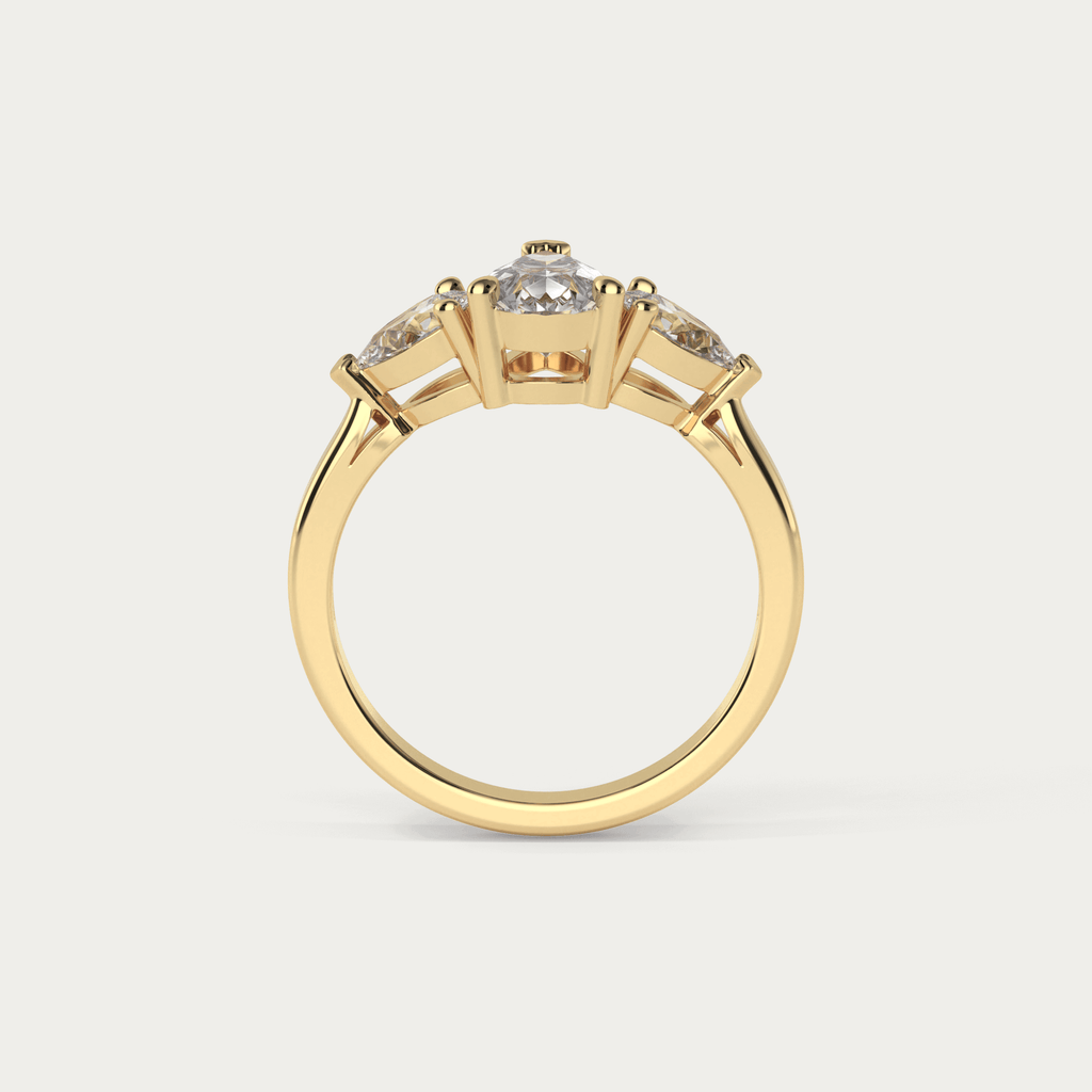 Trestensring med pæreslebet diamanter i 18 karat guld og GIA certifikat