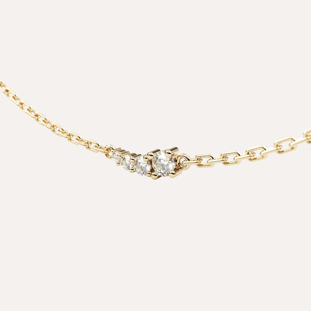 armbånd i 14k guld med diamanter